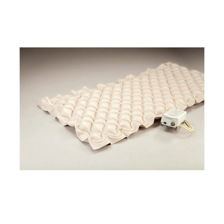 Alternating pressure air overlay system. Assists in the prevention of pressure problems for low risk patients