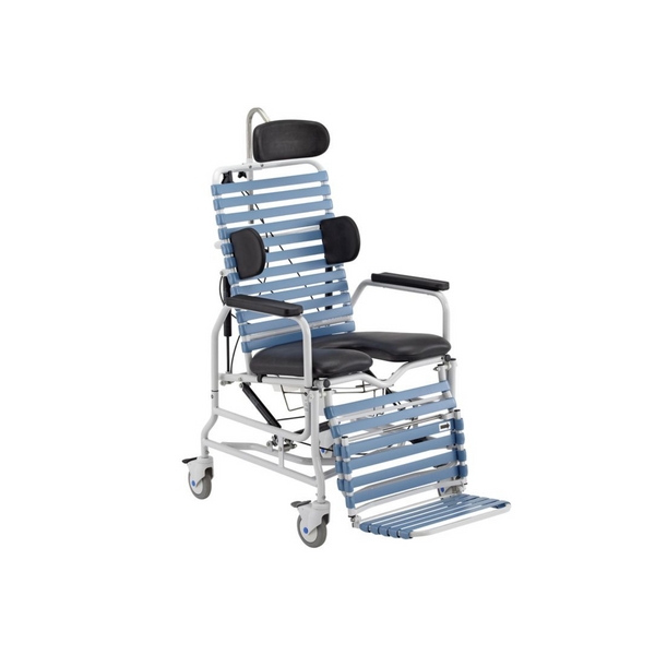  The image shows a white-framed commode chair with black padding on the seat and headrest. The chair features a tilt-in-space mechanism, illustrated with transparent overlays showing different reclined positions. It has armrests, footrests, and four caster wheels for mobility.