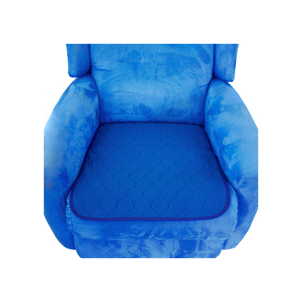 Blue velvet chair with a waterproof chair pad placed on the seat