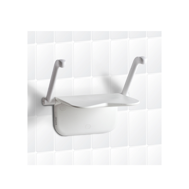 The seat has a velvety surface and a mild contour to increase stability and comfort. The unique front design allows alternative sitting positions. The arm supports provide a firm grip thanks to their non-slip coating and ergonomic design. The supporting legs add further stability if needed.