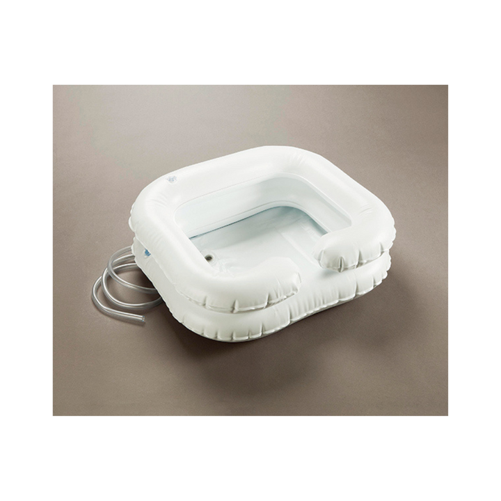 Inflatable hair washing sink with neck opening, dual rings for comfort, drainage tube, and heavy-duty vinyl—ideal for washing hair in bed.