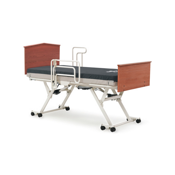 Invacare CS5 combines hi-lo and lo-lo features, reducing fall risk. Supports users up to 220kg, with low-profile castors, wall protection, and lifter clearance.
