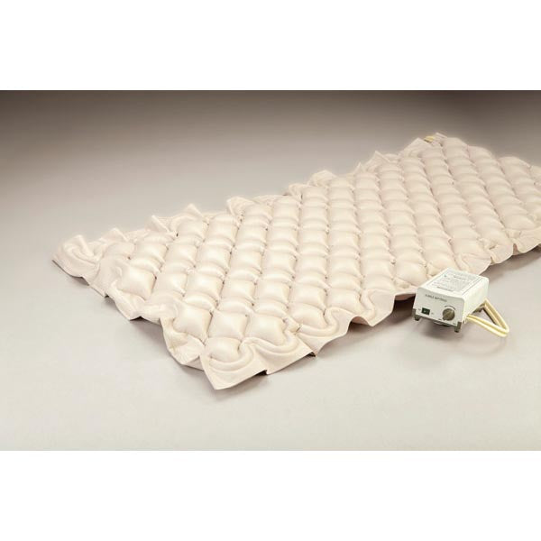 image of Alternating pressure air overlay system for low-risk patients, designed to help prevent pressure issues. Features air cell bubbles that inflate and deflate to enhance comfort and blood circulation. Adjustable air pressure, hygienic one-piece PVC construction, and a quiet pump that hooks onto the bed frame. Suitable for single bed size.