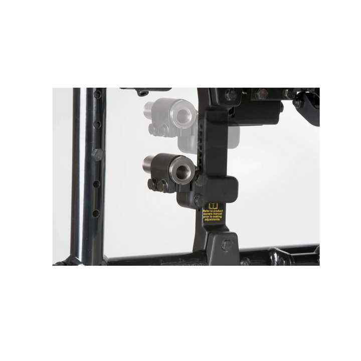 Close-up of a mechanical device with a clear panel on a white background