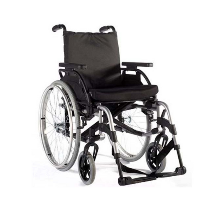 The Basix2 manual wheelchair with solid tyres with swing-away removable leg rests and swing back removable armrests. The wider rounded front armrests for greater comfort and safety.