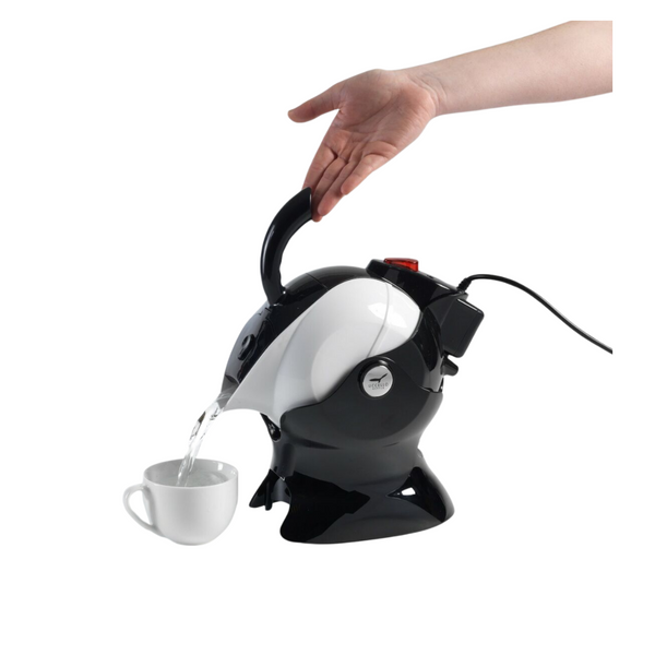 Image of a hand titling the kettle by pushing the handle downward