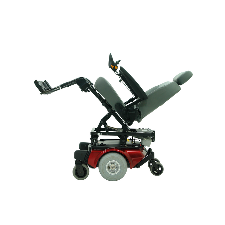 A Electric motorised tilt power chair placed at an angle