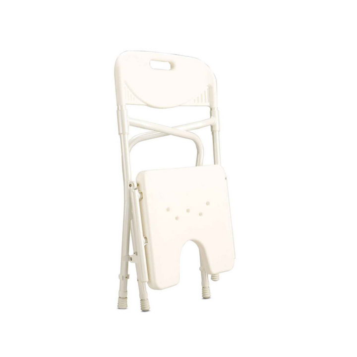  image of a folded shower chair with cut away plastic seat mounted on a aluminium frame. the shower chair has a backrest and armrests 